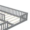 Close-up view of a grey wooden bed frame with wooden slats. Produktbild-Vorschau