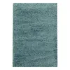 A rectangular shaggy rug in a teal color. Produktbild-Vorschau