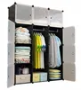 A modular wardrobe with clothes and folded items stored inside. Podgląd zdjęcia produktu