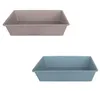 Two cat litter trays are shown against a white background. One is gray and the other is blue. Produktbild-Vorschau