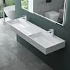 A modern bathroom with a double sink vanity, toilet, and bathtub visible in the reflection of a large mirror. Produktbild-Vorschau