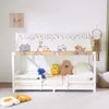 A white wooden bunk bed with a decorative canopy featuring cartoon cats and stars. Anteprima dell’immagine prodotto