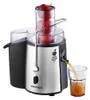 A juicer is shown with apples in the chute and juice being poured into a glass. Náhled obrázku produktu