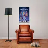 A poster of a K-Pop group is displayed on a wall above a leather armchair, with a floor lamp to the left and a dog lying on the floor to the right. Anteprima dell’immagine prodotto