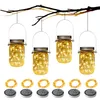 Four solar-powered mason jar lights hang from a tree branch, with four additional solar lids and wire coils shown below. Produktbild-Vorschau