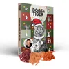 An advent calendar for cats, featuring a cat wearing a Santa hat and scarf, with a picture of Guido Maria Kretschmer and piles of cat treats in the foreground. Produktbild-Vorschau