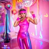 A woman in a retro outfit dancing in a pink room with disco balls and streamers. Voir les images du produit