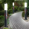 A garden path lined with bollard lights. Produktbild-Vorschau