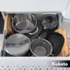 A drawer filled with kitchenware, including pots, pans, and cutting boards. Náhled obrázku produktu