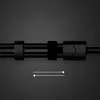 A close-up of a black audio cable with a connector, set against a dark, textured background. Arrows indicate movement or adjustment. Anteprima dell’immagine prodotto