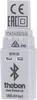 A close-up of a white electronic dongle with various labels and symbols. Náhled obrázku produktu