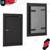 Two views of a black metal access panel or maintenance door, one closed and one open showing the interior frame, set against a blueprint-style background. Náhled obrázku produktu