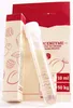 A product shot of a small bottle of liquid next to its packaging, with illustrations of fruits on the packaging. Produktbild-Vorschau