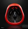 The inside of a red helmet with black interior padding and straps, set against a black background. Produktbild-Vorschau