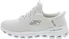 A side view of a white Skechers training shoe. Voir les images du produit
