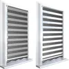 Two identical window blinds are displayed side-by-side, showcasing their design and how they can be adjusted. Produktbild-Vorschau