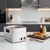 A hot dog steamer is shown on a kitchen counter with hot dogs inside, along with buns, condiments, and tongs. Anteprima dell’immagine prodotto