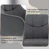 Close-up views of a dark gray chair, highlighting its upholstery and texture. Produktbild-Vorschau