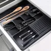 A drawer organizer filled with kitchen utensils. Náhled obrázku produktu