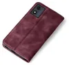 A burgundy flip case for a smartphone is shown from a diagonal top-down view against a white background. Produktbild-Vorschau