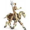 A skeleton figure riding a skeleton horse, against a white background. Náhľad obrázku produktu