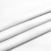 A close-up, angled view of white fabric, folded into three layers. Produktbild-Vorschau
