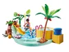 A toy water park with figures, a slide, a pool, and a palm tree. Anteprima dell’immagine prodotto