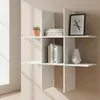 A white modular wall shelf unit with 6 compartments, displaying books, a plant, and a vase. Produktbild-Vorschau
