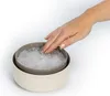 A hand is shown being placed into a bowl filled with ice-like crystals, suggesting a cooling or absorption process. Náhľad obrázku produktu
