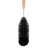 A black bottle brush with a wooden handle. Produktbild-Vorschau