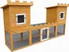 A wooden animal enclosure designed to look like a castle, shown against a white background. Produktbild-Vorschau