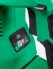 A close-up view of a control panel on a green power tool. Voir les images du produit