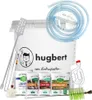 A collection of items for winemaking, including a large fermentation bucket, tubing, a hydrometer, various packets of additives, and cleaning brushes. Produktbild-Vorschau
