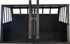An empty, black, double dog crate with a central divider and two doors. Voir les images du produit