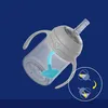 A baby's sippy cup with a weighted straw, shown at an angle against a blue background. A circular inset shows a diagram illustrating how the weighted straw works. Produktbild-Vorschau