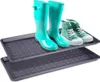 Two shoe trays stacked on top of each other, with boots and shoes on the top tray. Náhled obrázku produktu