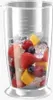 A clear blender jar filled with various fruits and ice cubes. Podgląd zdjęcia produktu
