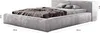 A modern upholstered bed with pillows and a blanket. Náhľad obrázku produktu