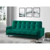 A green sofa is shown in a room with artwork on the wall. Produktbild-Vorschau