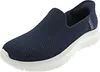 A single navy blue Skechers slip-on shoe with a white sole, presented on a white background. Produktbild-Vorschau