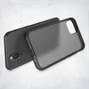 A black iPhone 11 Pro with a black phone case on a light gray textured background. Produktbild-Vorschau
