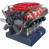 A model of a V8 engine with transparent casing, showing internal parts and lights. Produktbild-Vorschau