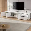 A modern living room with a white TV lowboard and a television mounted on the wall. Anteprima dell’immagine prodotto