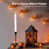 A Halloween-themed display featuring LED candles and a lantern. Podgląd zdjęcia produktu