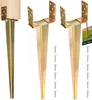 Three metal ground spikes with U-shaped brackets for posts, one with a wooden post attached, and a small tag with a logo and image of grass. Produktbild-Vorschau