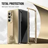 A gold-colored phone case is shown with its components, including a frame, and a phone. Náhled obrázku produktu