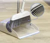 A close-up of a dustpan and brush set on a wooden floor, with a magnified view of the brush bristles. Náhľad obrázku produktu