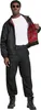 A man wearing a black jacket with a red plaid lining, black pants, and black boots. Anteprima dell’immagine prodotto