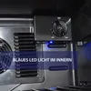 Close-up view of the interior of a mini-refrigerator, showing a fan, a temperature control dial, and a blue LED light. Produktbild-Vorschau