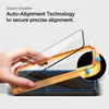 A hand is shown holding an orange alignment tool to place a screen protector onto a smartphone. Anteprima dell’immagine prodotto